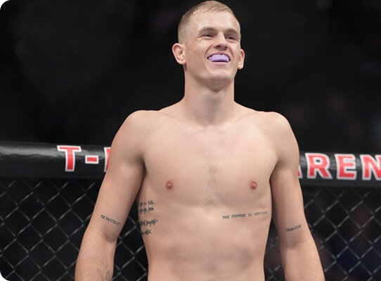 Boxer smiling with an IMPACT gumshield